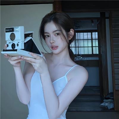 照片的她